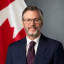 Ambassador Peter  MacDougall